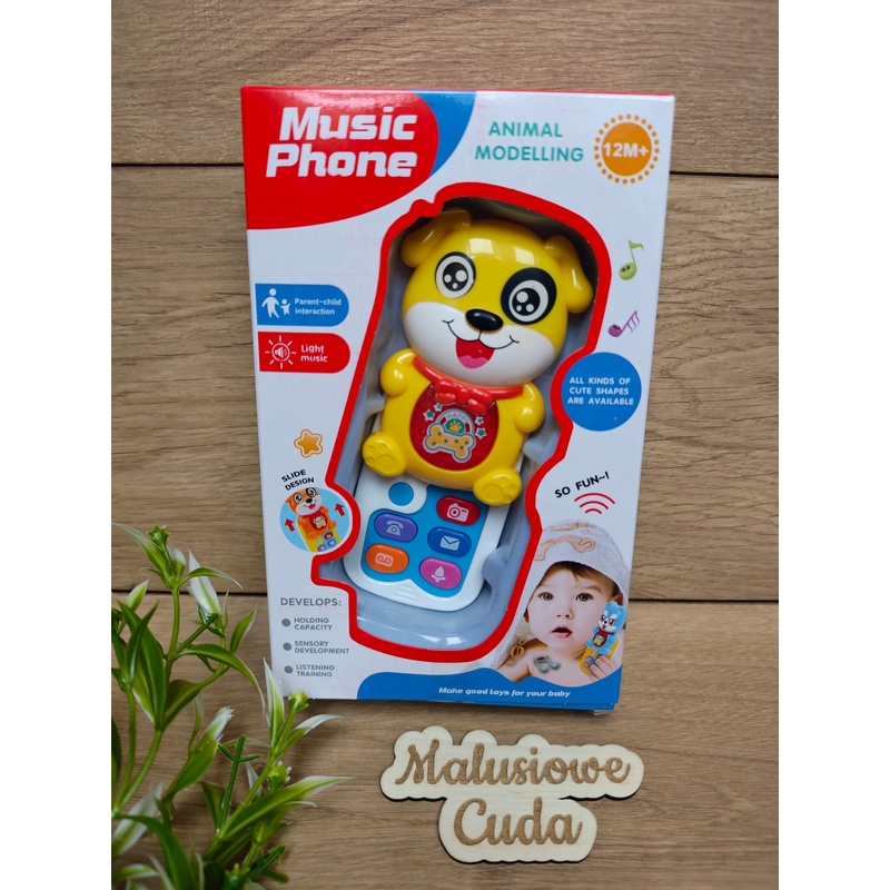 Telefon grający piesek zółty 12m+